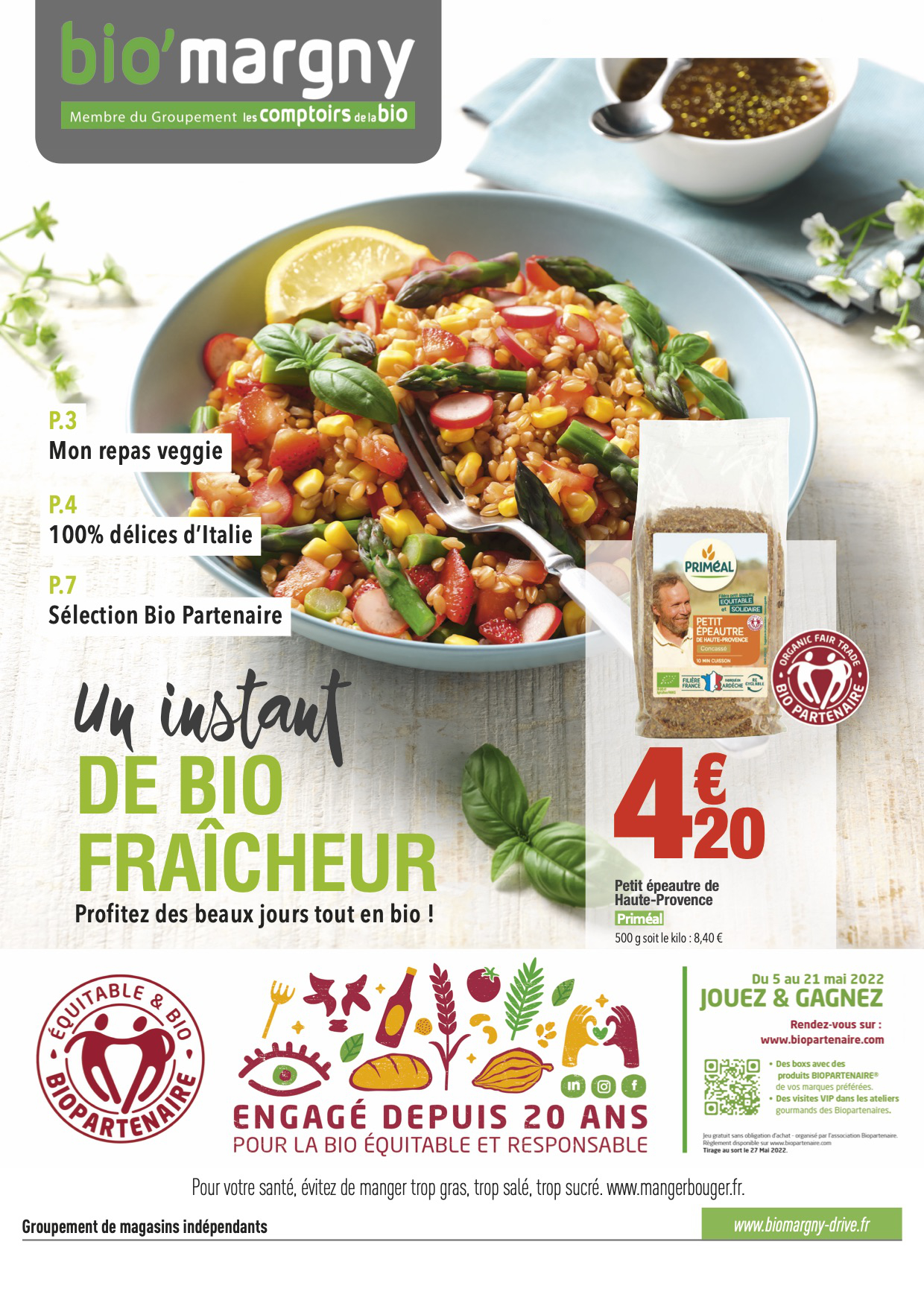 Photographie d'un catalogue publicitaire Bio'margny, avec salade, petit épeautre, et logos bio/équitable. Par Studio ZE, photographe publicitaire à Toulouse.